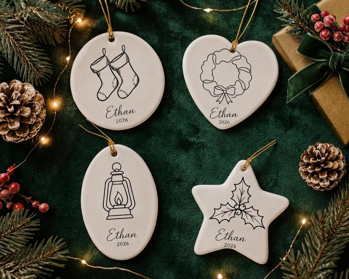 Personalized festive ceramic ornaments with stockings, wreath, lantern and holly designs in four shapes on green velvet