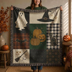 Woman holding up the Halloween patchwork woven blanket with a ghost, witch hat, pumpkins and black cat