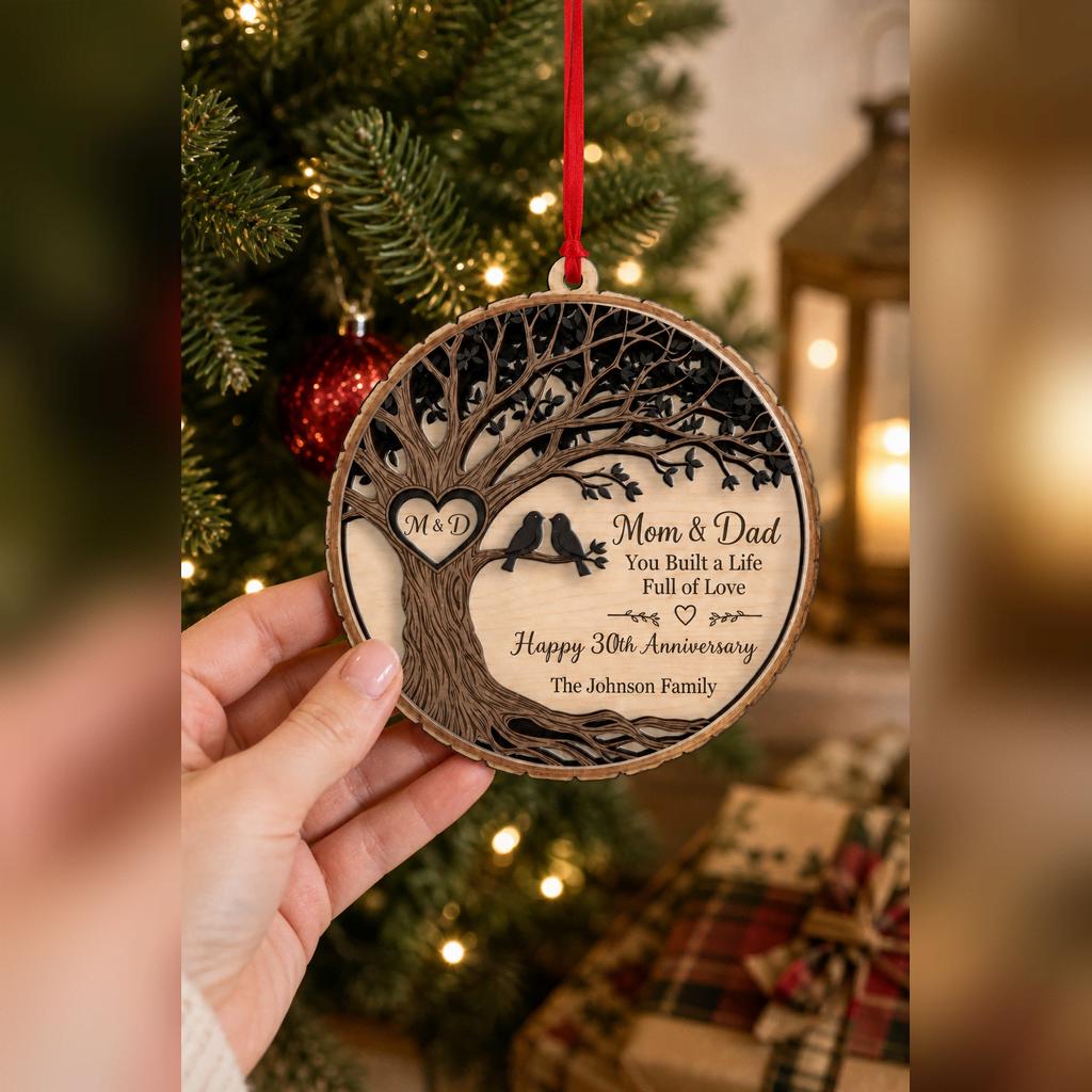 Hand holding a personalized Happy 30th Anniversary family tree wooden ornament