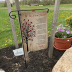 As I Sit In Heaven cardinal tree poem memorial garden flag with name on a garden flag stand in a yard with potted flowers