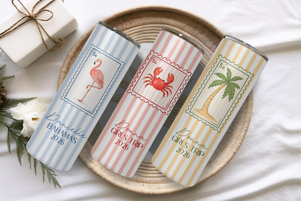 Three striped beach vacation tumblers with flamingo, crab and palm tree stamp designs and names
