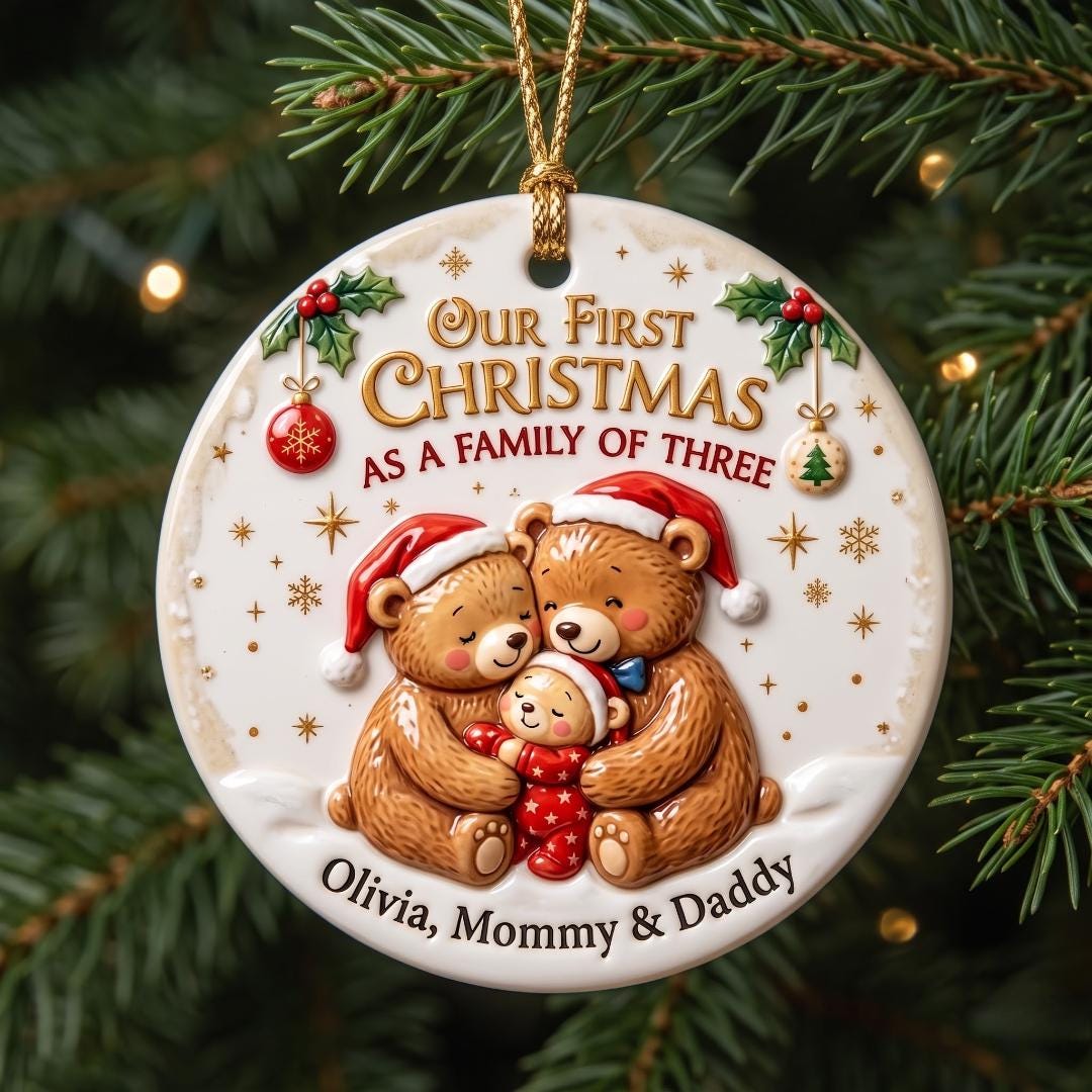 Bear family of three ornament on a dark pine tree