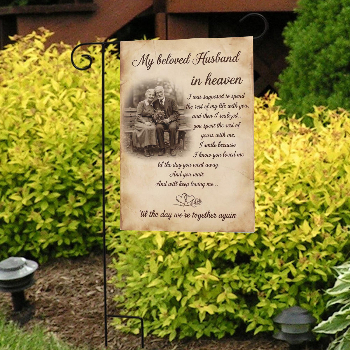 My Beloved Husband In Heaven poem photo memorial garden flag in front of bright yellow shrubs