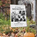 Black and white In Loving Memory photo collage garden flag among autumn leaves with a pumpkin