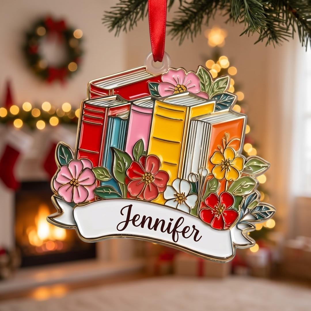 Personalized book stack ornament hanging in front of a cozy fireplace
