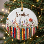 Raised 3D book and wildflower ornament on a pine branch with fairy lights