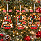 Bookshelf letter ornaments A, B and C with names on a tree