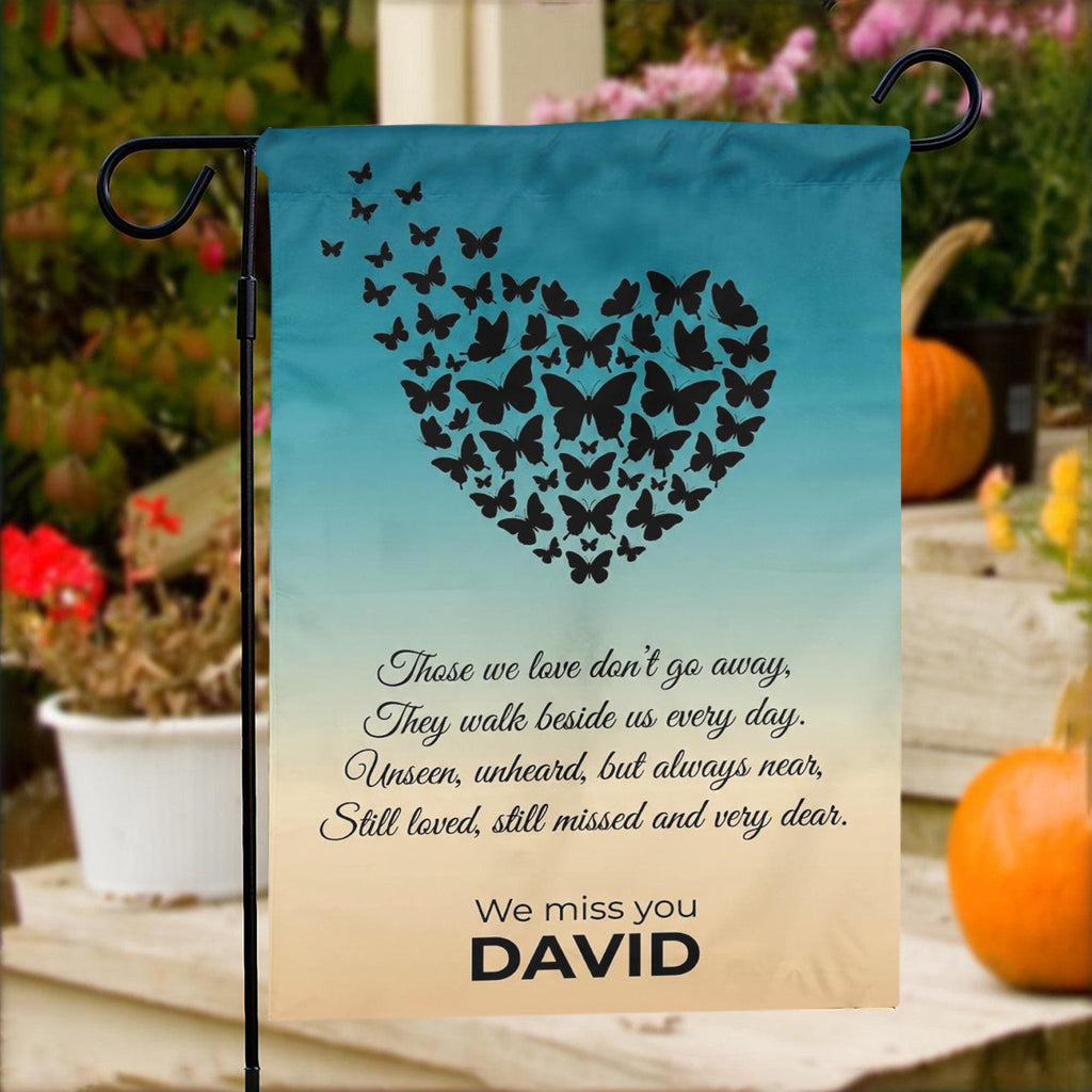 Butterfly heart Those We Love Don't Go Away memorial garden flag on porch steps with pumpkins and flowers