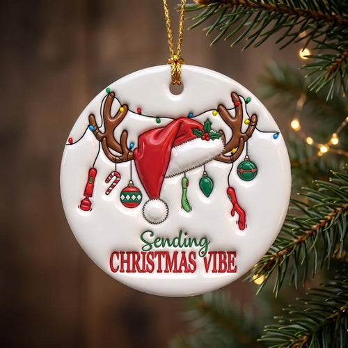 Christmas Vibe round ceramic ornament hanging against a wood background