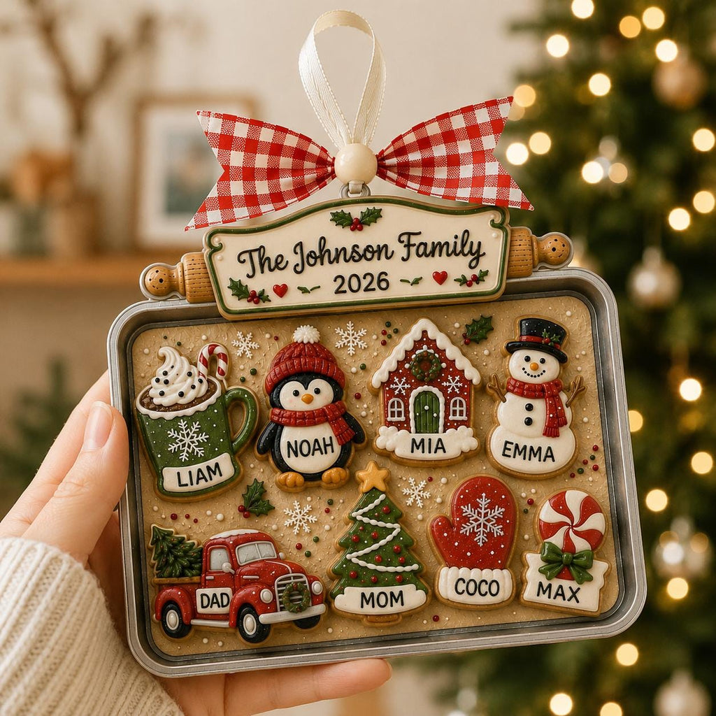 Hand holding a personalized cookie baking tray ornament
