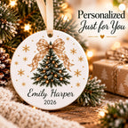 Linen gingham bow tree name ornament on a cozy holiday table