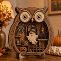 Layered wooden owl shelf sitter with a witch-hat ghost and black cat inside
