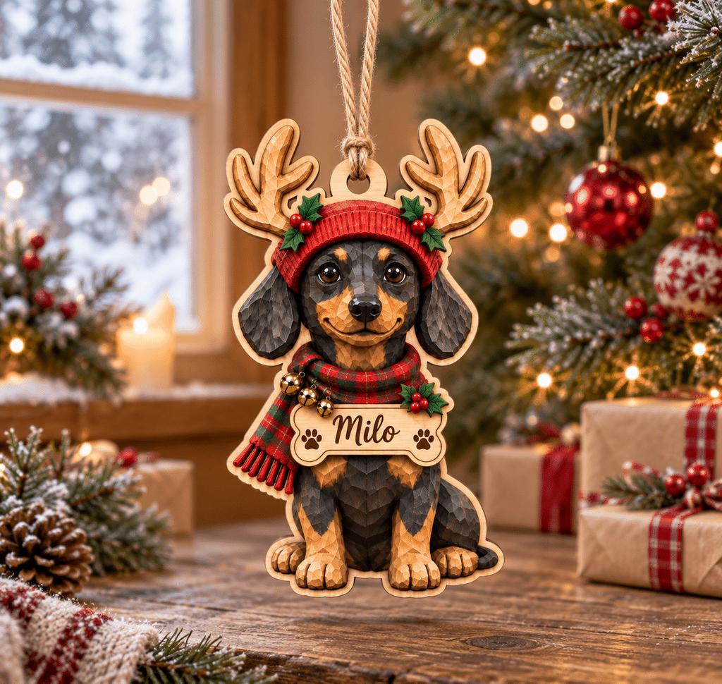 Dachshund reindeer ornament with custom name bone tag on a wooden table