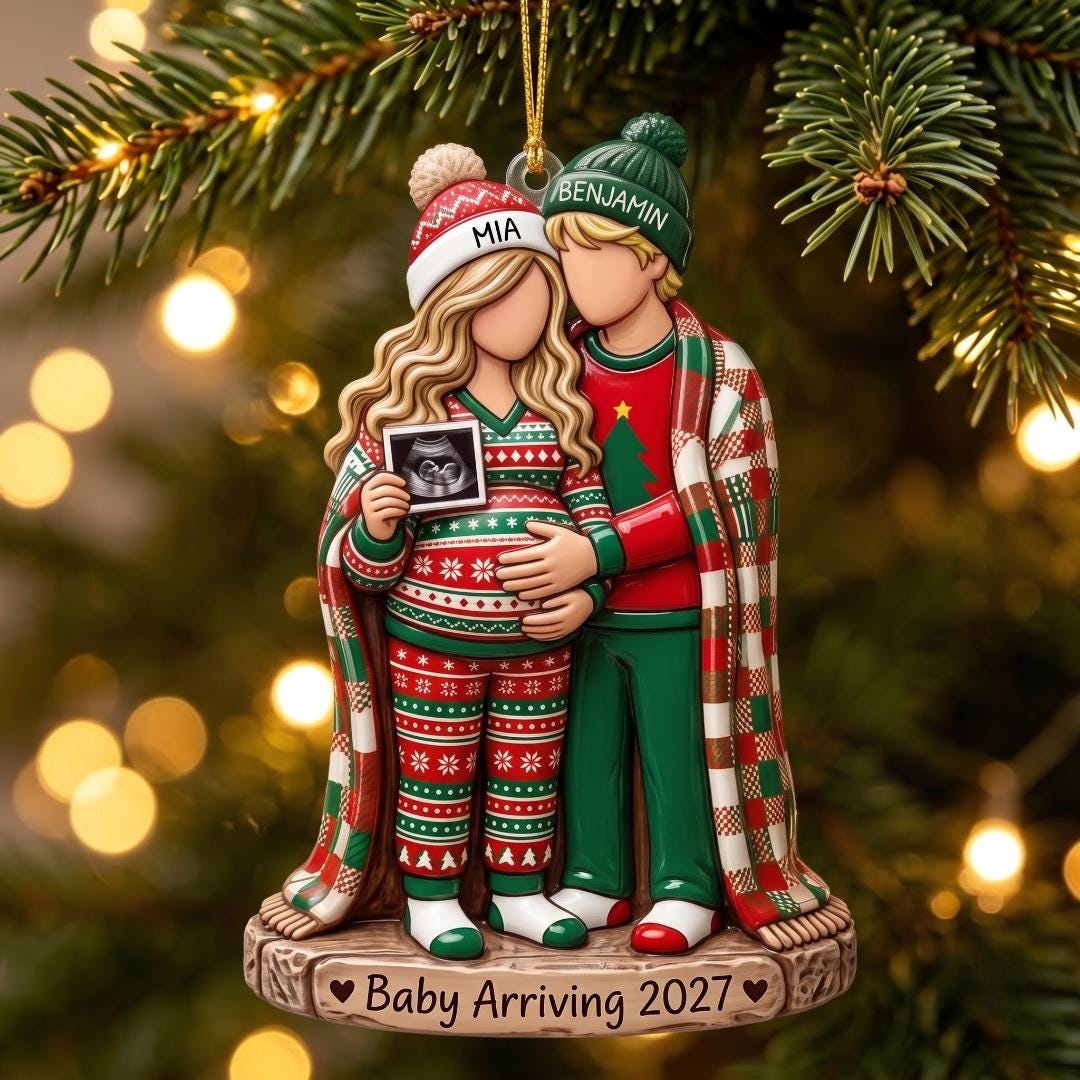 Personalized expecting parents ornament with a couple in Christmas sweaters holding an ultrasound and Baby Arriving 2027