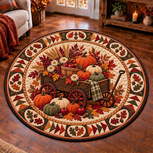 Fall harvest wagon round quilted rug with pumpkins, apples and wheat on a warm wood floor by a sofa