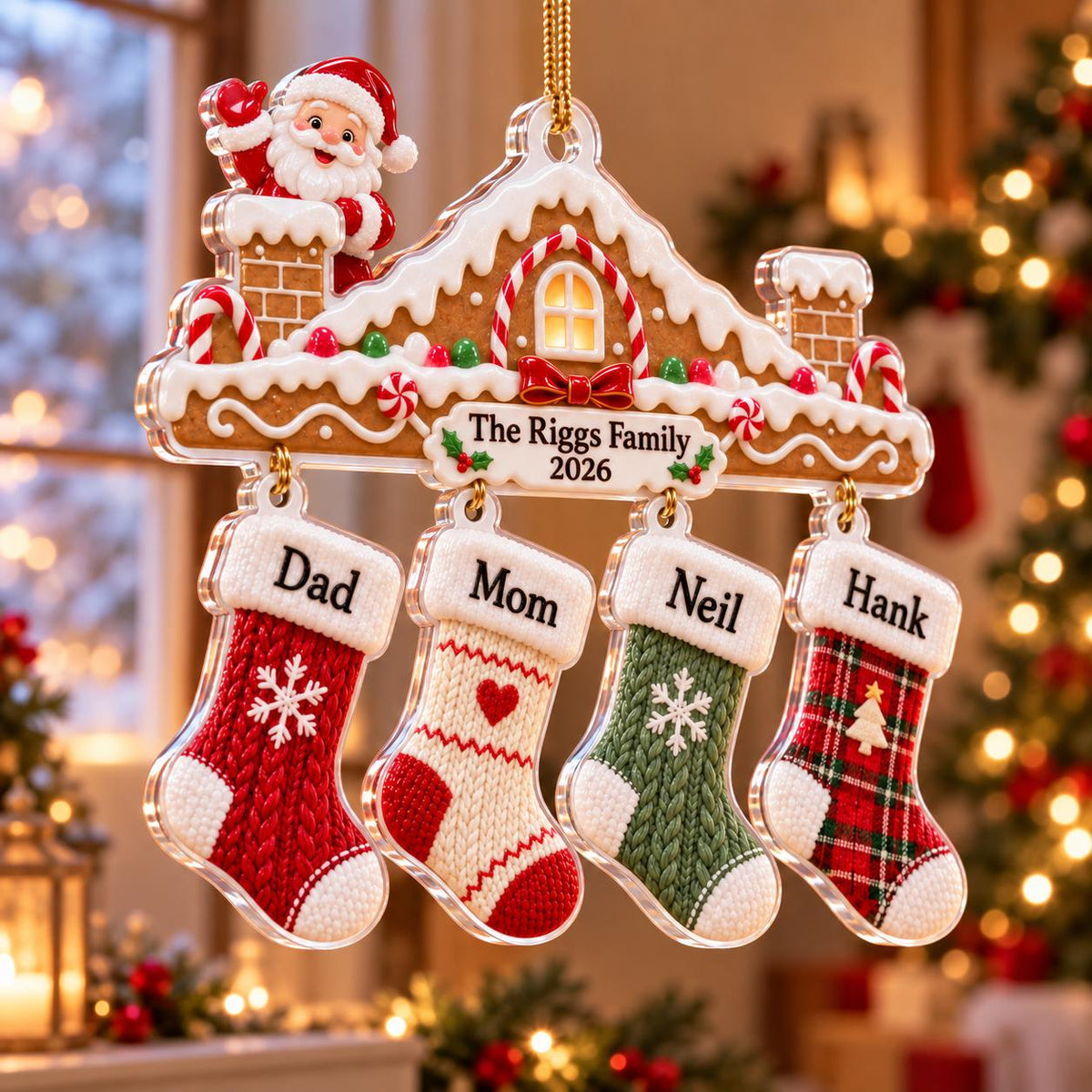 Gingerbread house family stocking ornament in front of a snowy window