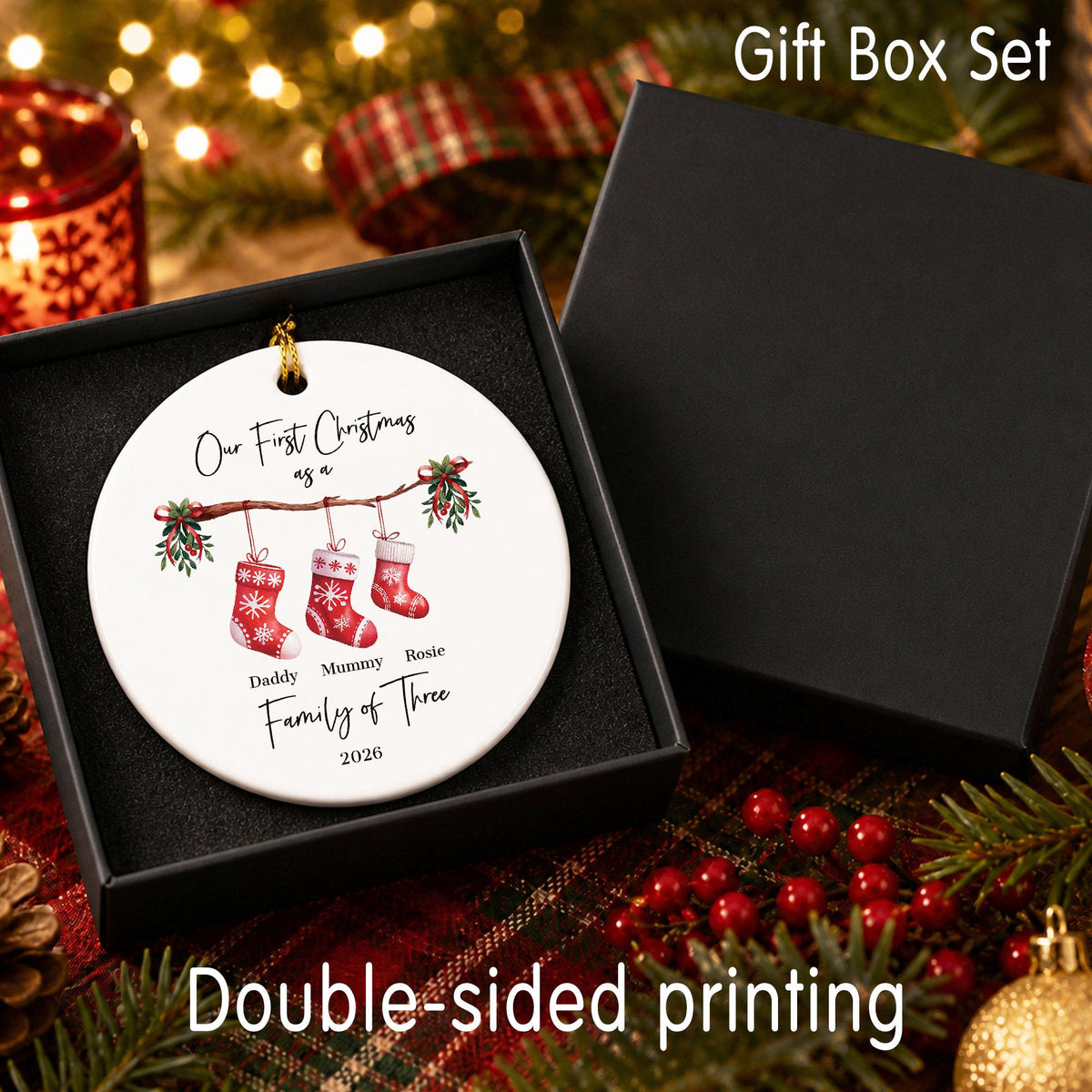 First Christmas family ornament shown in a black gift box for styling
