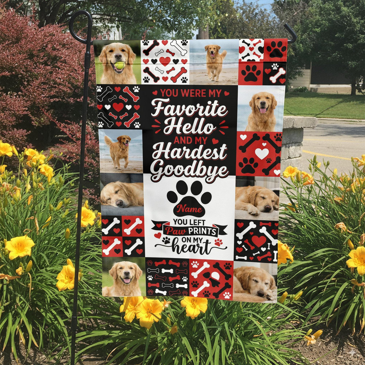 Favorite Hello Hardest Goodbye dog memorial photo collage garden flag in a garden bed with yellow lilies