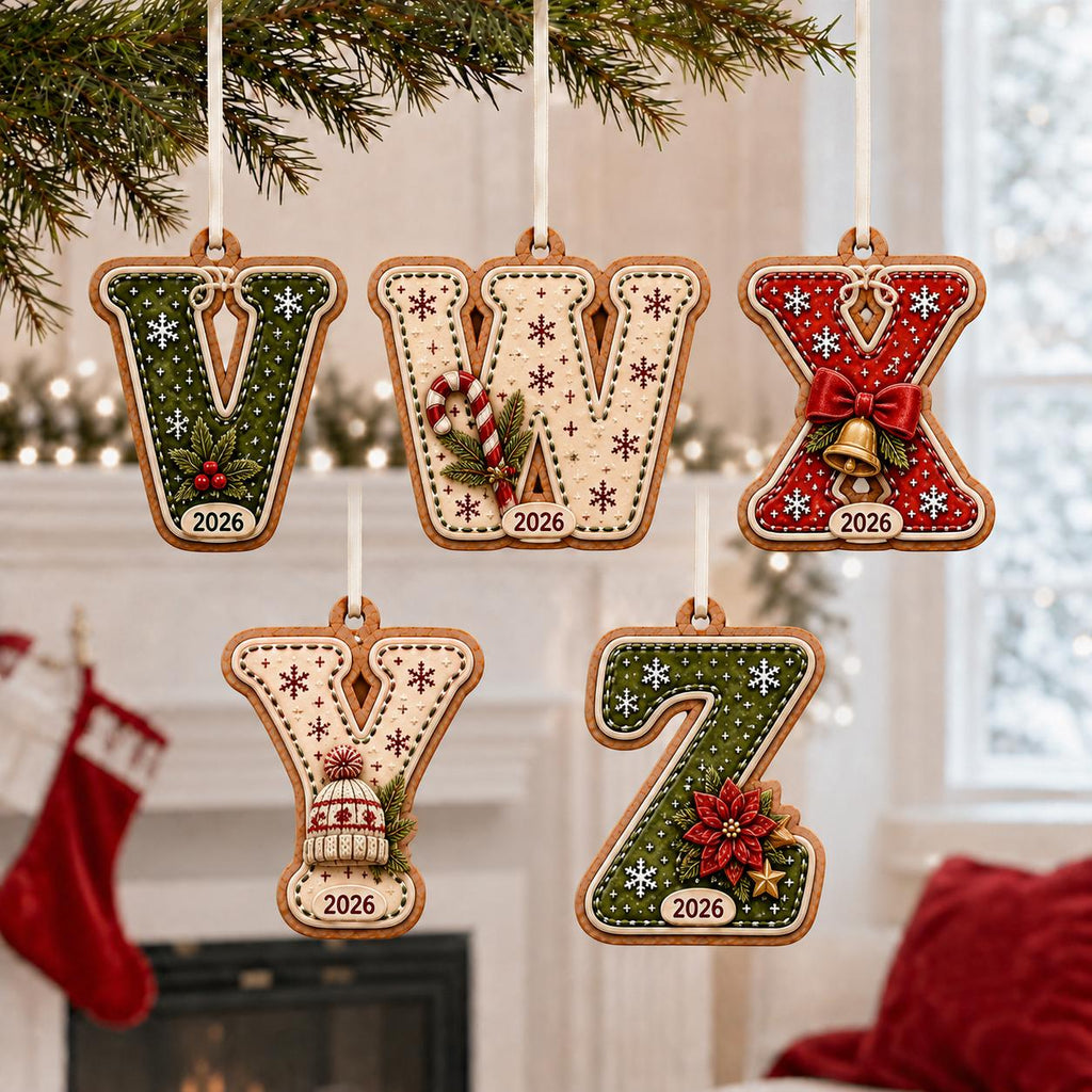 Gingerbread letter ornaments V to Z with holiday motifs and year hanging by stockings