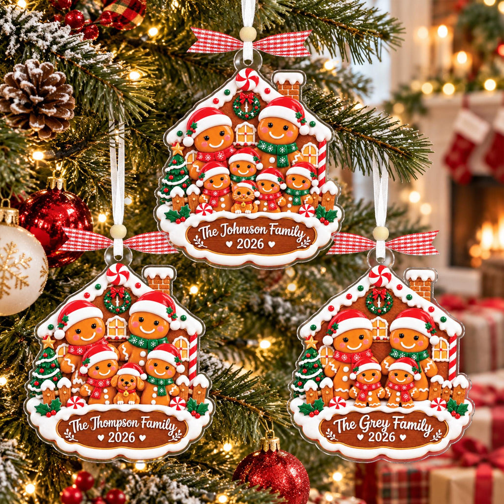 Three gingerbread family ornaments on a Christmas tree