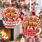 Personalized gingerbread family hot cocoa mug ornaments by the fireplace