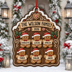 Gingerbread family name ornament with six gingerbread kids by a snowy front door