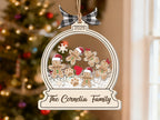 The Cornelia Family gingerbread ornament with warm bokeh lights