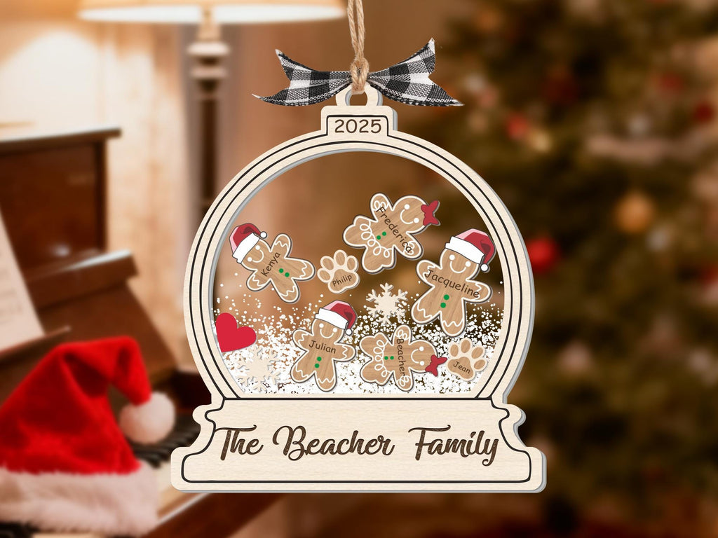 Gingerbread family Christmas ornament near a piano and Santa hat