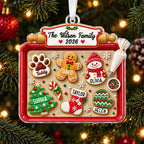 Gingerbread cookie family ornament among red baubles