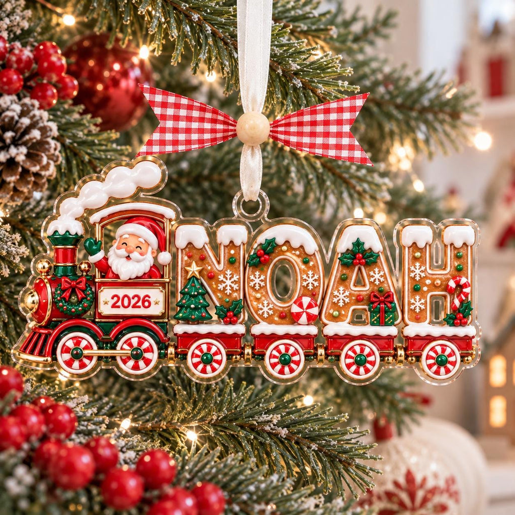 Santa train ornament with gingerbread letters Noah on a tree