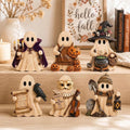 Six wooden Halloween ghost shelf sitters: vampire, pumpkin carver, witch, raven messenger, masquerade and grave keeper