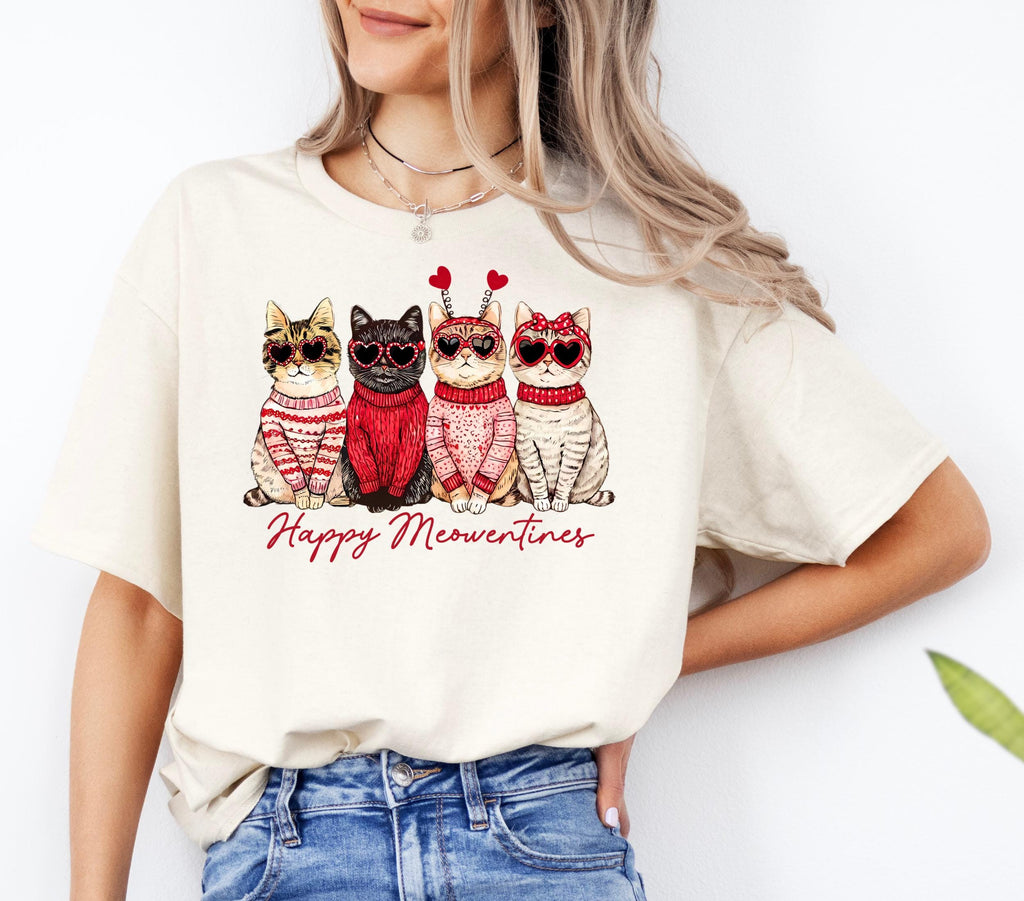 Woman wearing a cream Happy Meowentines Valentine cat tee