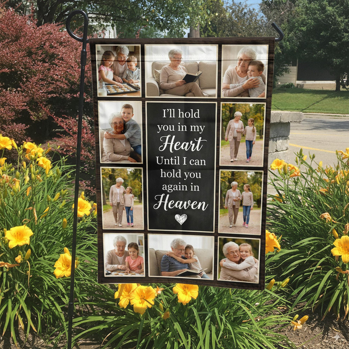 I Will Hold You In My Heart chalkboard photo collage memorial garden flag in a garden bed with yellow lilies