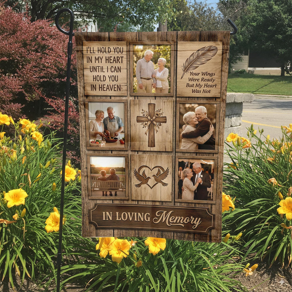 Rustic wood I Will Hold You In My Heart photo collage memorial garden flag in a garden bed with yellow lilies