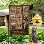 Rustic wood I Will Hold You In My Heart photo collage memorial garden flag on a garden stand by a log cabin with a beehive and bear statue
