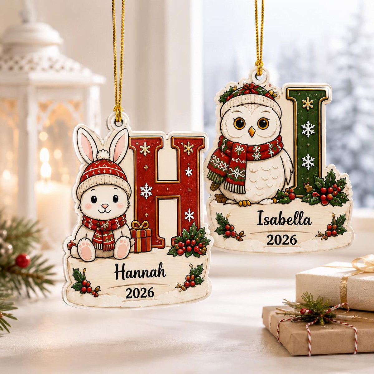 Bunny H and owl I kids initial name ornaments by a snowy window