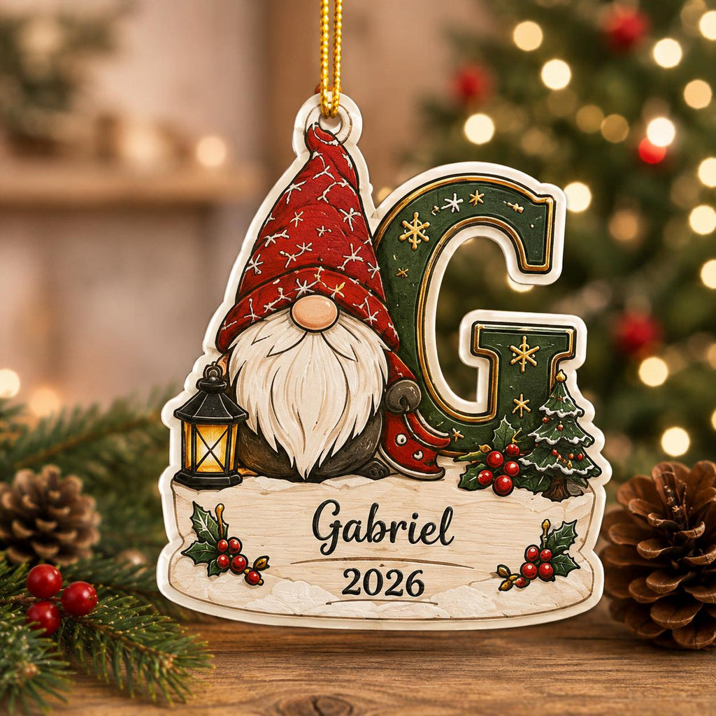 Gnome letter G kids initial wooden ornament with name and year beside pine cones