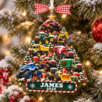 Truck Christmas tree ornament hanging on a snowy tree