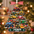 Monster truck Christmas tree ornament with James 2026 on a tree