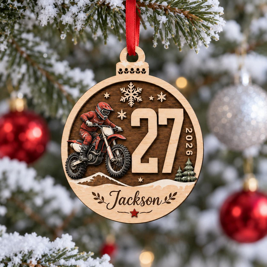 Dirt bike race number round wooden ornament hanging among red and silver baubles