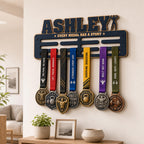 Navy fitness medal holder with name Ashley and weightlifting medals