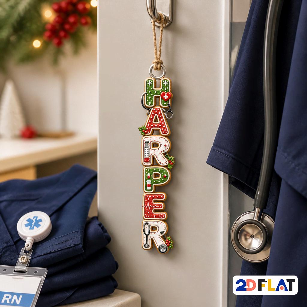 Personalized nurse name ornament spelling Harper hanging by scrubs and a stethoscope