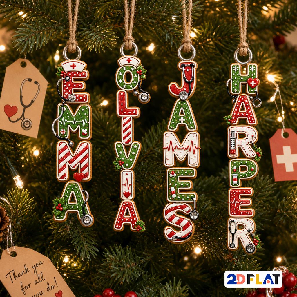 Four personalized nurse vertical letter name ornaments hanging on a Christmas tree