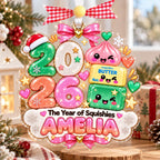 Squishy 2026 ornament with Amelia on a wood slice