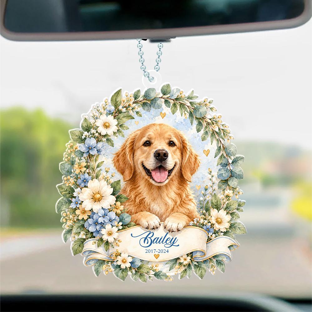 Floral pet photo ornament hanging from a car mirror