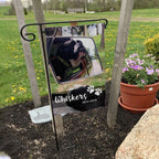 Example of another personalized pet memorial flag with a dog photo and name, shown in a yard