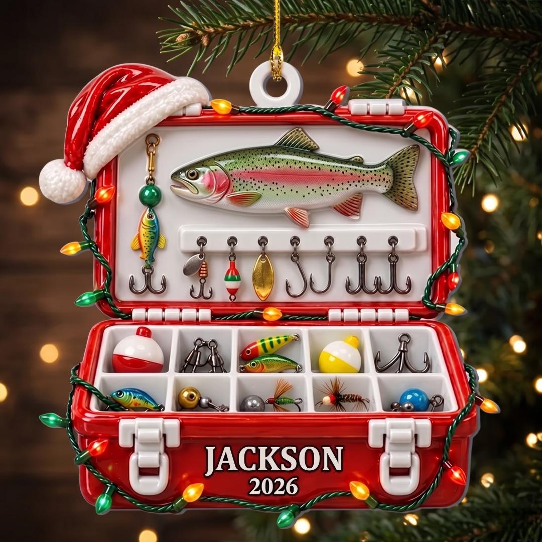 Red tackle box ornament in a Santa hat hanging on a Christmas tree