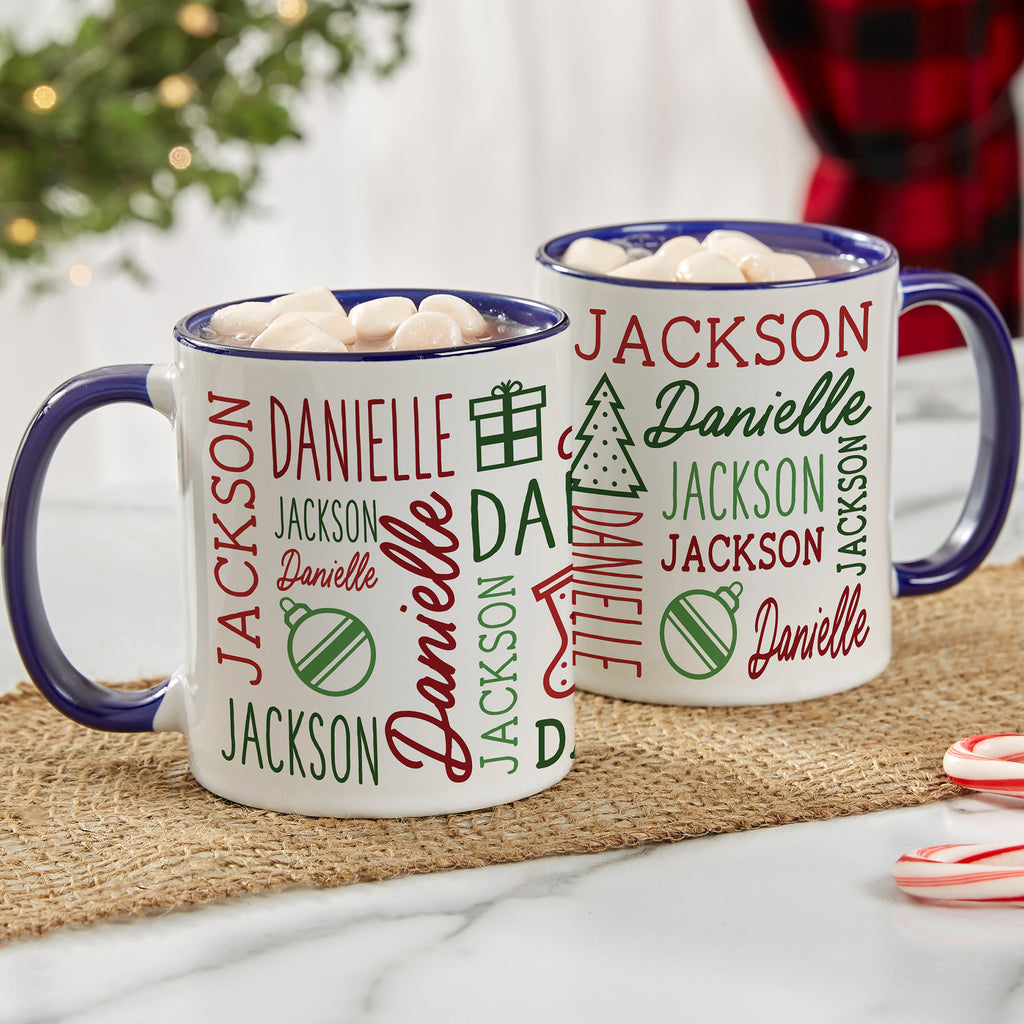 Navy blue handle Christmas mugs printed with the names Jackson and Danielle