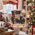 Retired and Relaxing armchair wooden ornament with custom name held near a tree