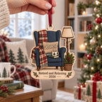 Retired and Relaxing armchair wooden ornament with custom name held near a tree